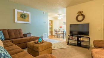 Somerpointe livinf room with carpet flooring and couches surrounding